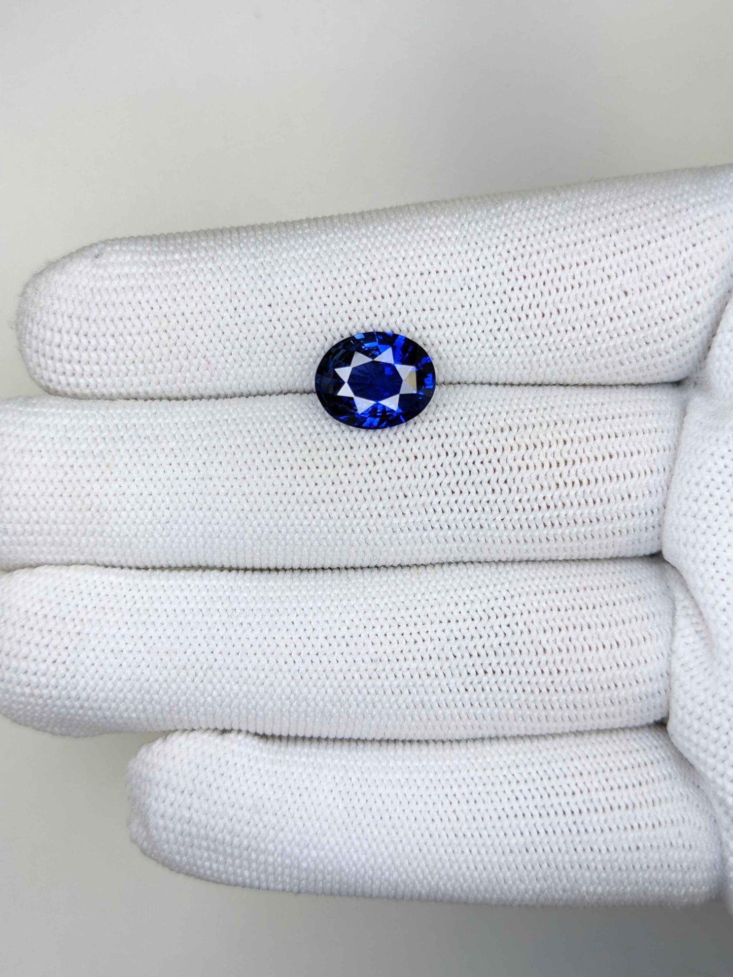 4.13 Carat Oval Cut Heat Blue Sapphire Loose Gemstone On Hand