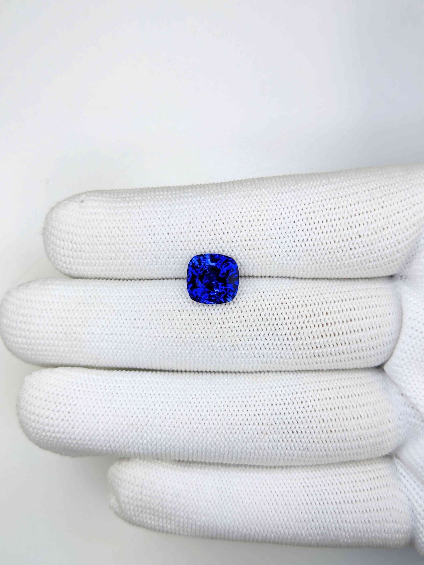 4.51 Carat Cushion Cut Heat Blue Sapphire Loose Gemstone On Hand
