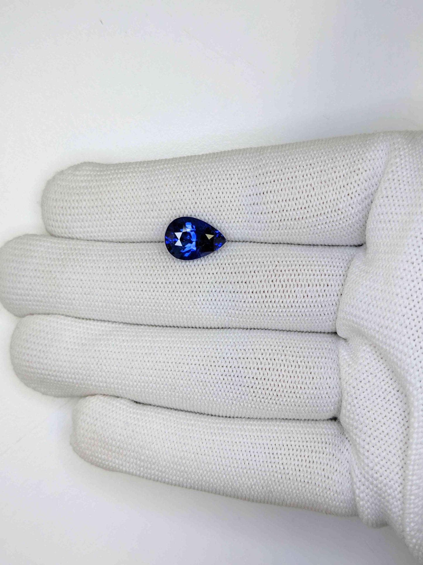 4.61 Carat Pear Cut Heat Blue Sapphire Loose Gemstone On Hand