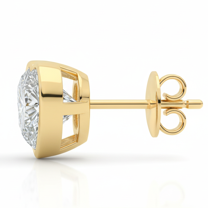 Gold diamond earring on a white background