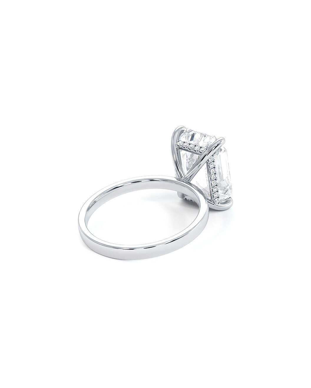 White gold ring with a diamond on a white background