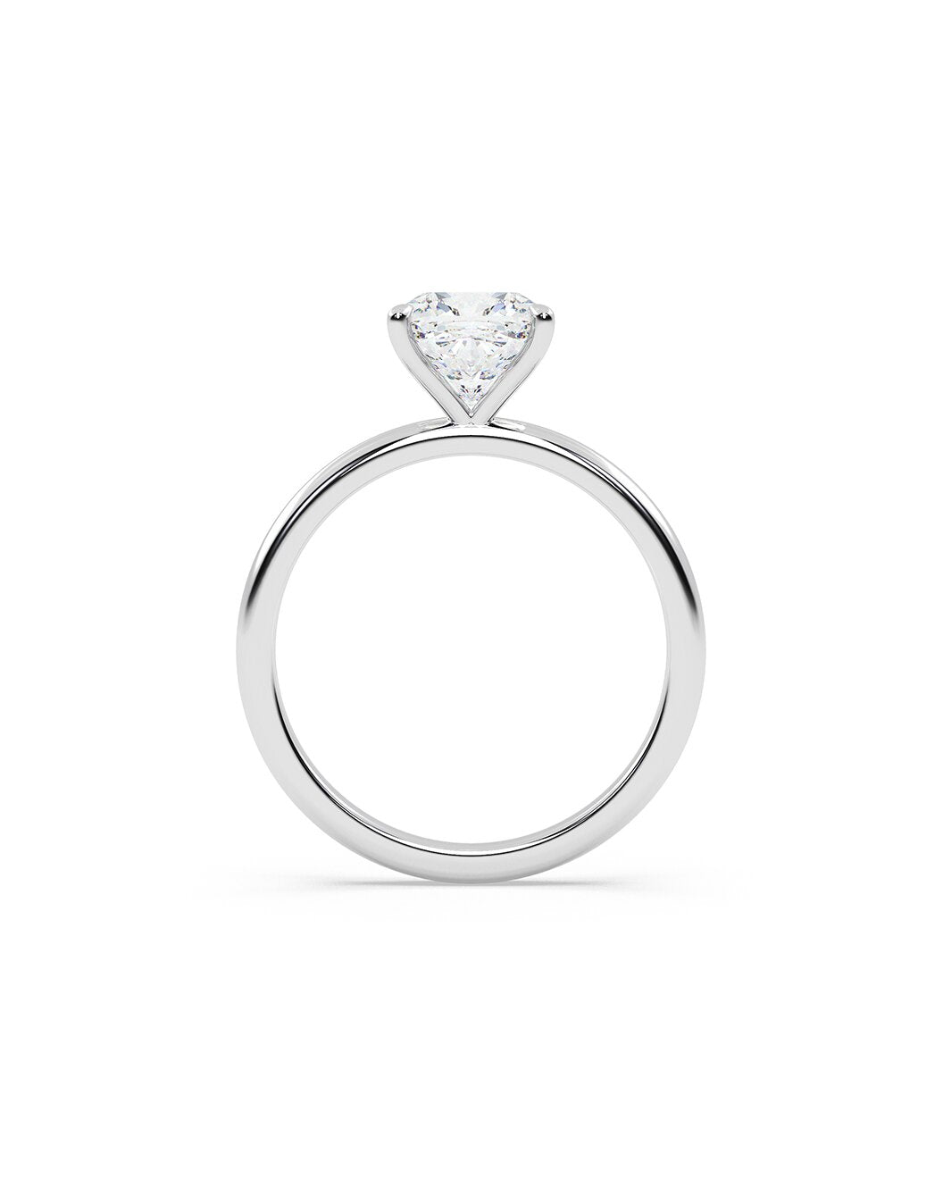 Silver ring with a cushion shaped diamond on a white background