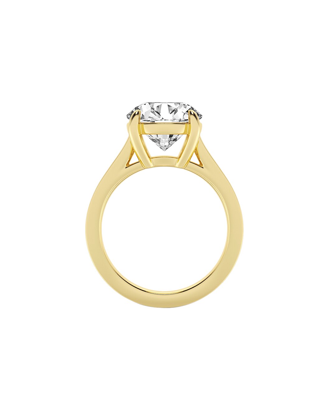 Gold ring with a clear gemstone on a white background side