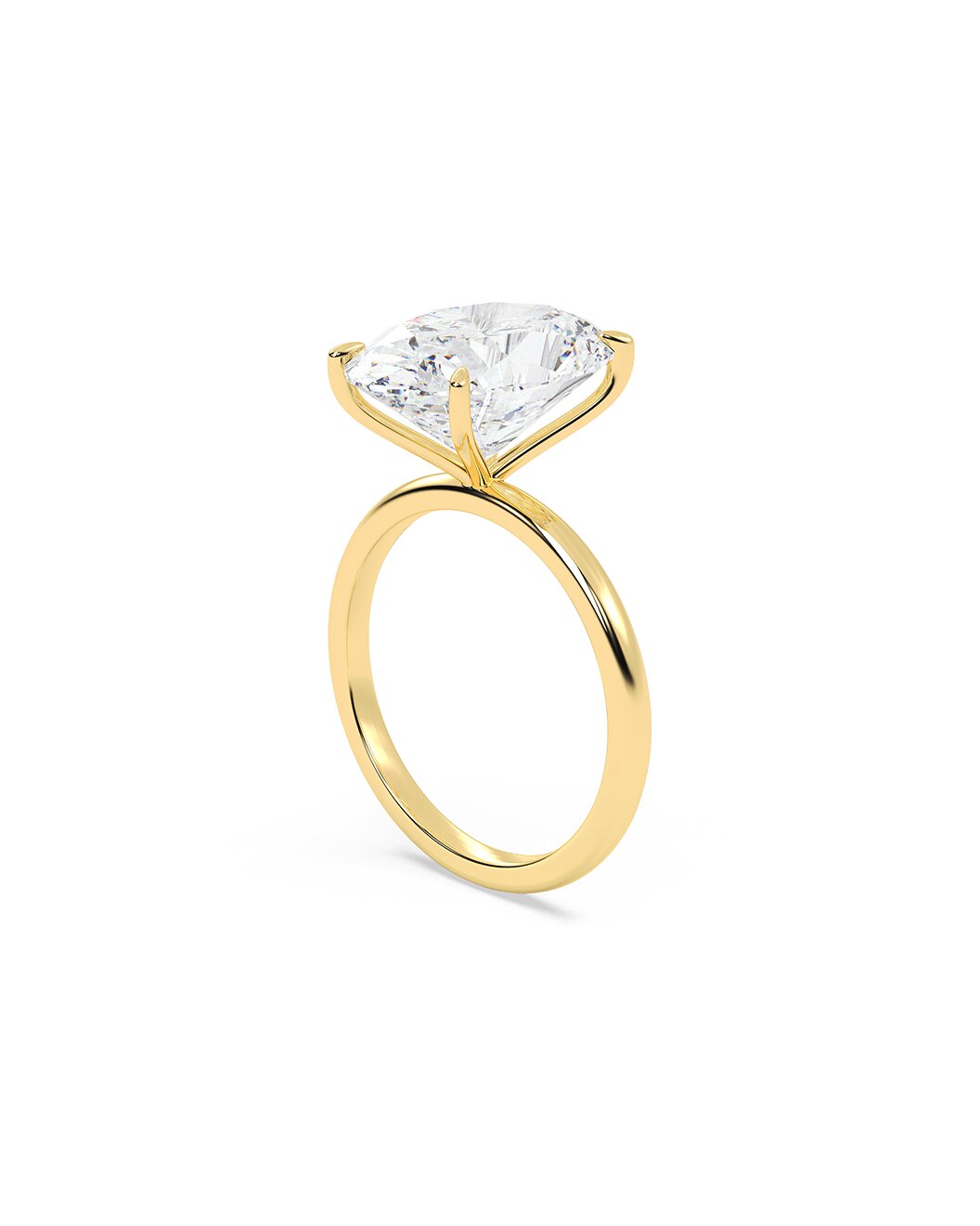 Yellow gold ring with a large diamond on a white background