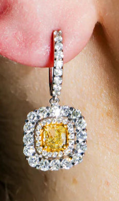 Norine 3 Carats Cushion Cut Fancy Yellow Diamond Drop Earrings in 14K White Gold Wear