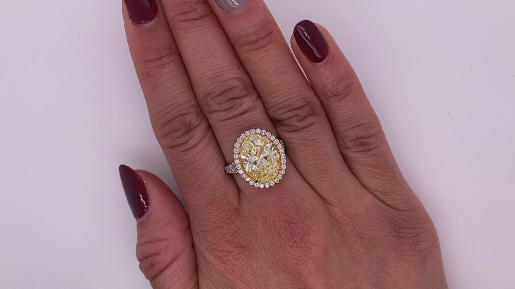 Yellow Diamond Ring Oval Cut 7 Carat Halo Ring in Platinum & 18K Yellow Gold View on Hands