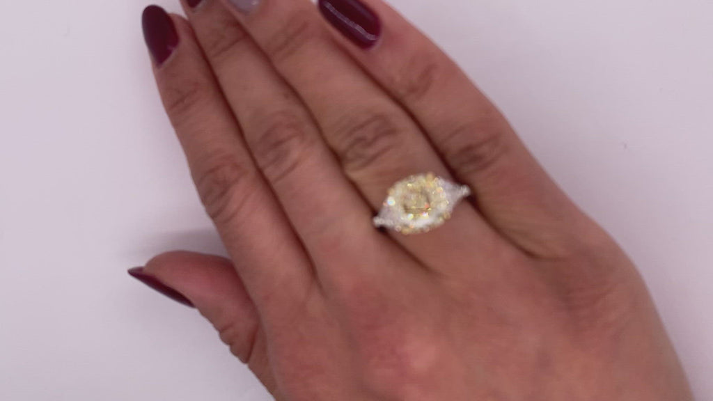 Fancy Yellow Diamond Ring Cushion Cut 5 Carat Three Stone Ring in Platinum & 18K Gold Video on Hand