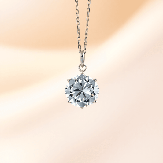 Close-up of a sparkling diamond pendant on a fine chain against a soft, elegant background with gentle lighting highlighting its brilliance and facets.