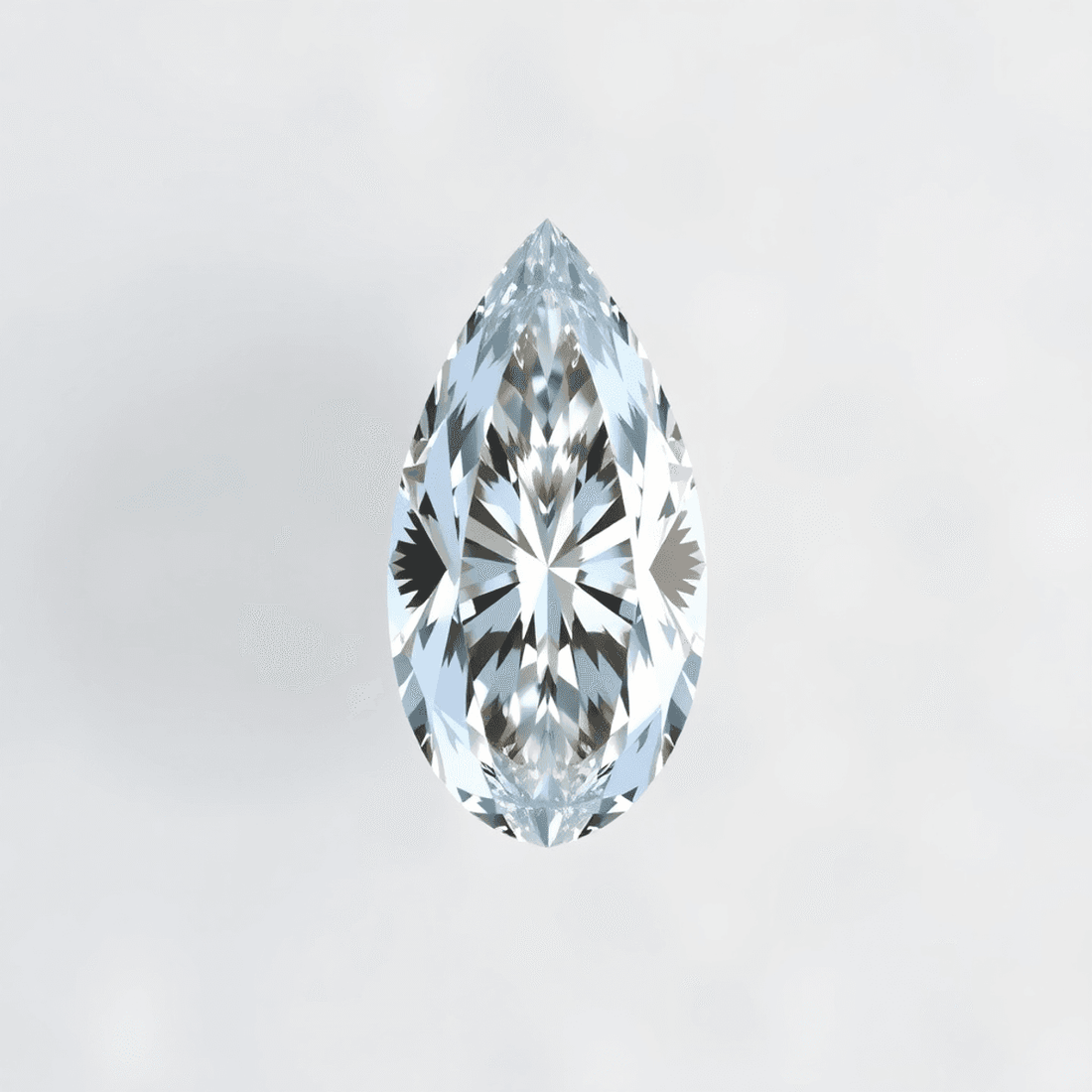 Top view of a sparkling pear-cut diamond with brilliant facets against a soft, blurred background highlighting its size and brilliance.