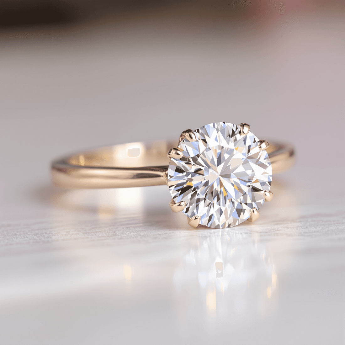 Close-up of a sparkling round brilliant diamond engagement ring with radiant facets on a sleek, elegant background under soft, warm lighting.