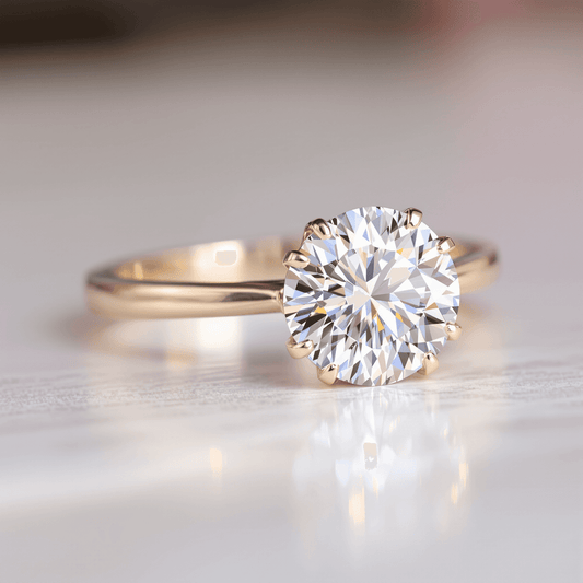 Close-up of a sparkling round brilliant diamond engagement ring with radiant facets on a sleek, elegant background under soft, warm lighting.