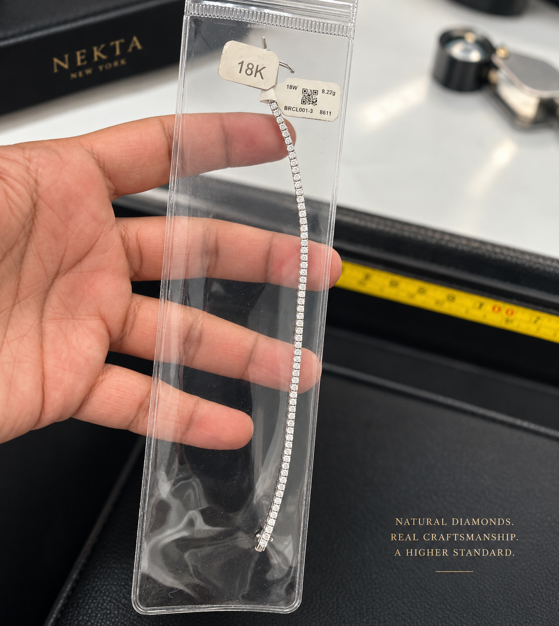 Natural diamond tennis bracelet in 18K white gold, 8.22 grams, photographed in New York City Diamond District