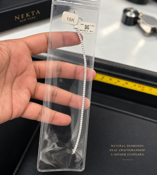 Natural diamond tennis bracelet in 18K white gold, 8.22 grams, photographed in New York City Diamond District