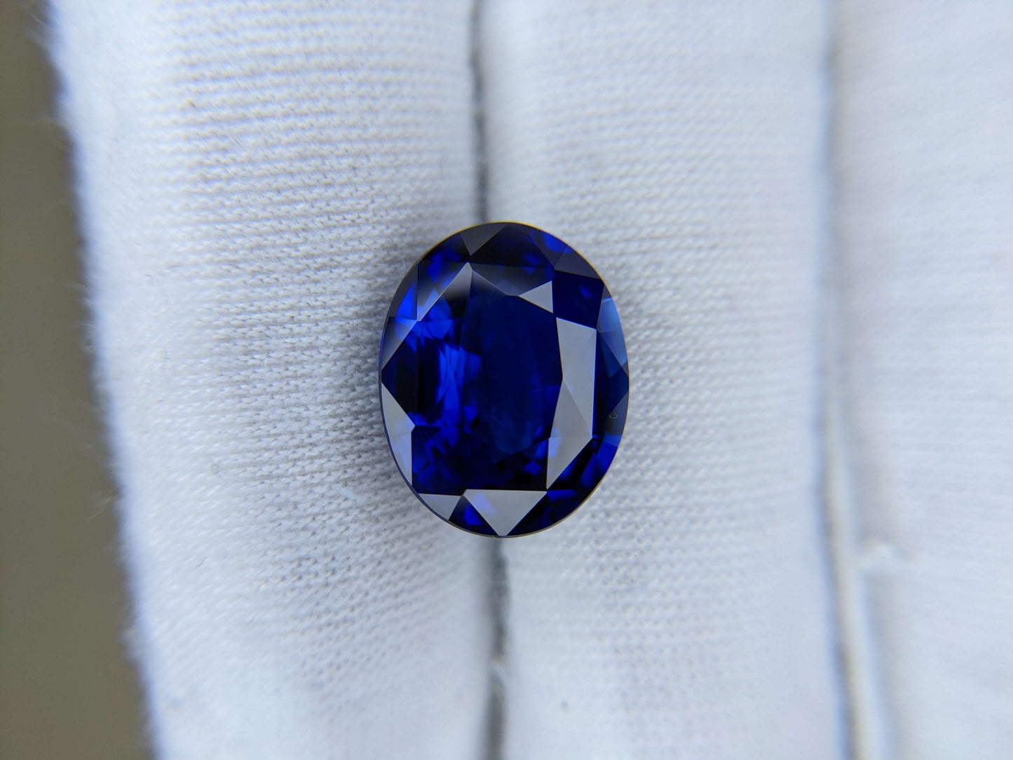 Blue gemstone on a white background
