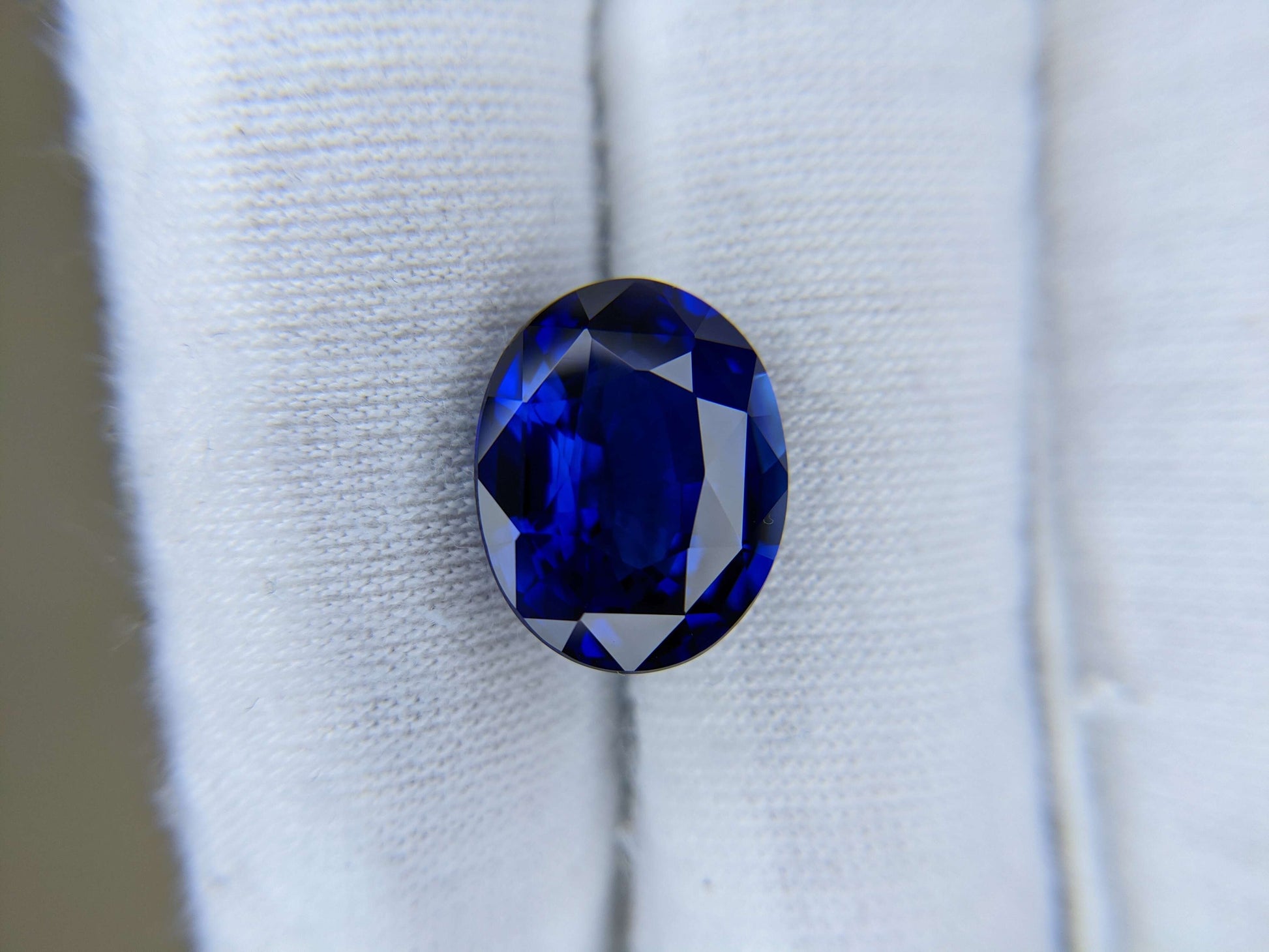 Blue gemstone on a white background