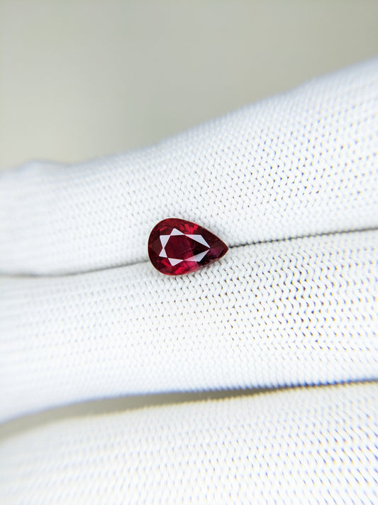 3.01 Carats Pear Cut Heat Red Ruby Loose Gemstoneon hand