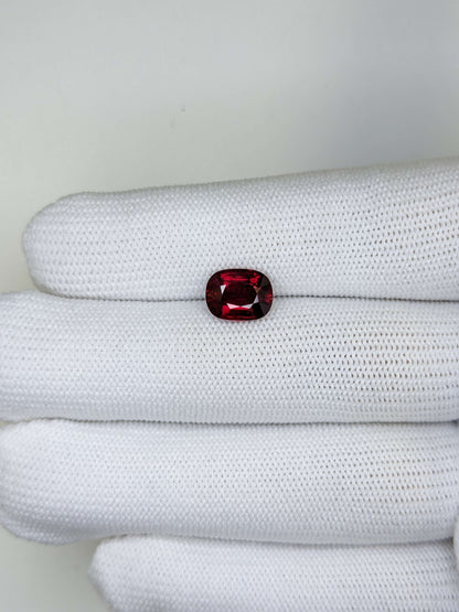 Red ruby gemstone on a white background