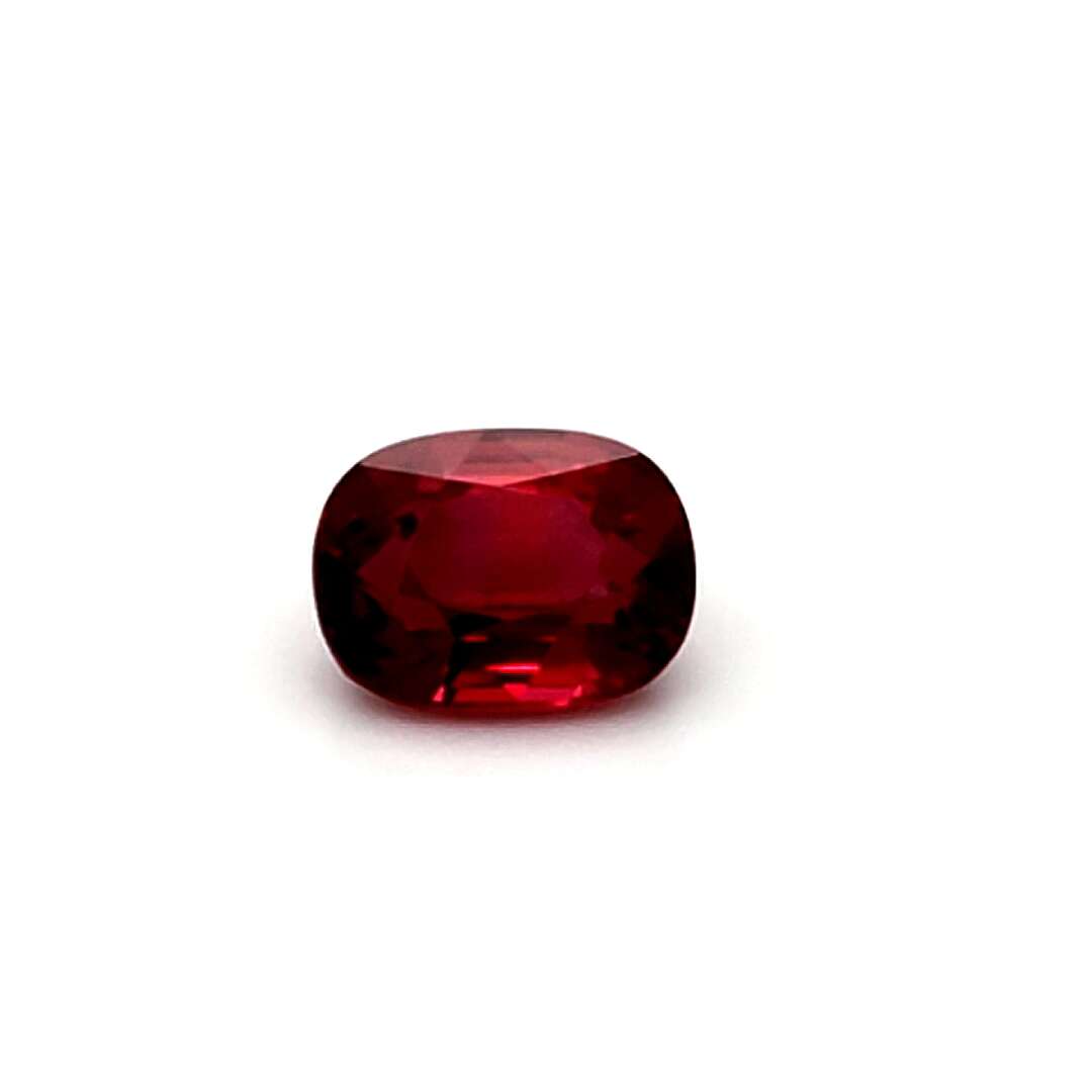 Red ruby gemstone on a white background