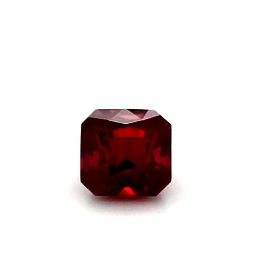 Red ruby gemstone on a white background