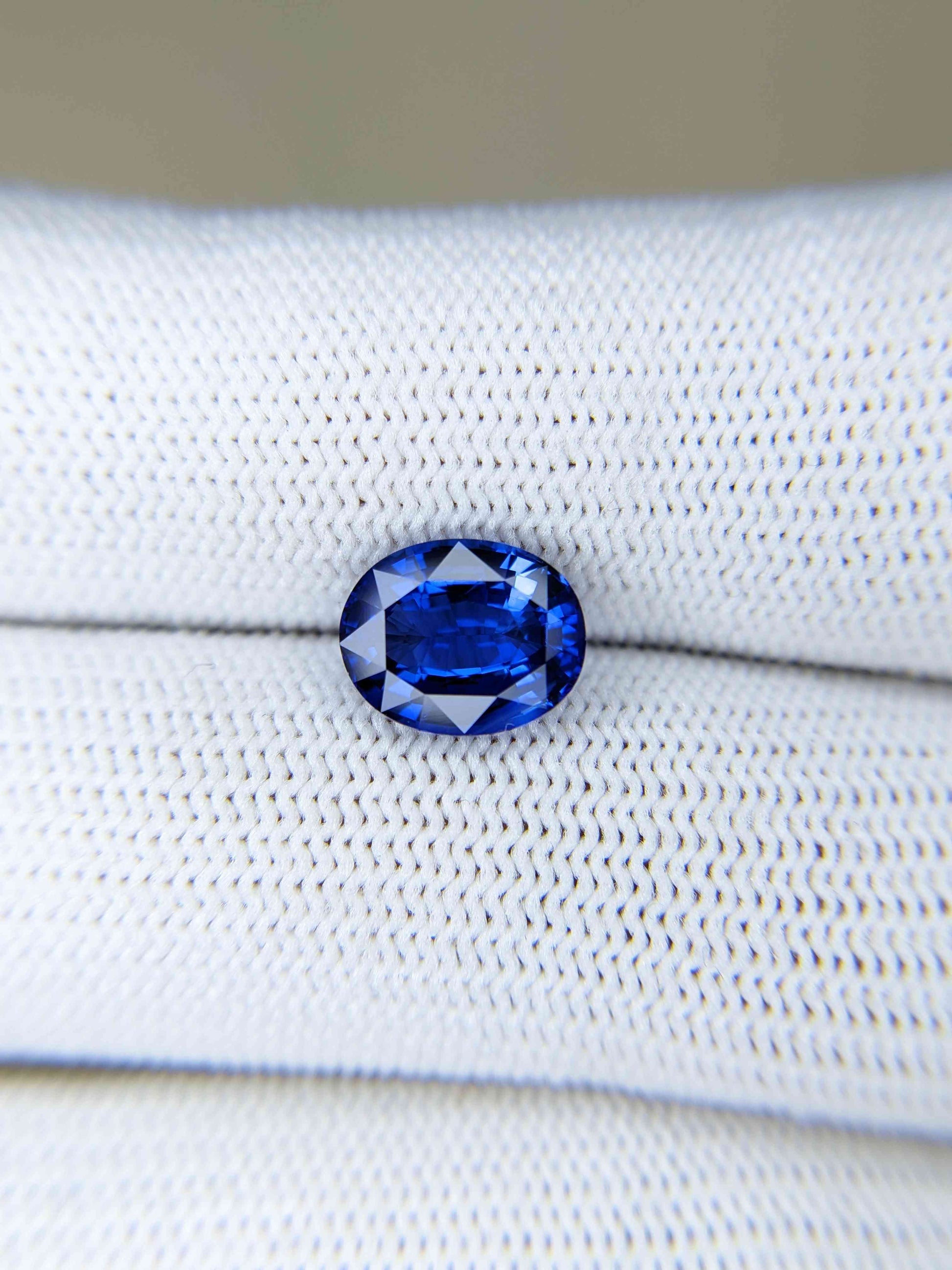 3.02 Carat Oval Cut Heat Blue Sapphire Loose Gemstone on hand