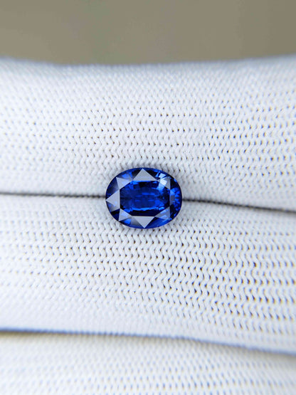 3.02 Carat Oval Cut Heat Blue Sapphire Loose Gemstone on hand