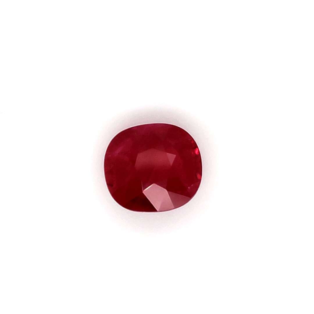 Red gemstone on a white background