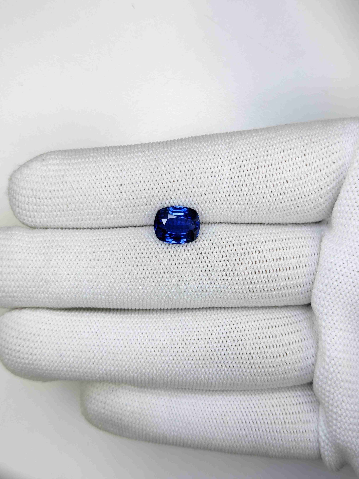 3.10 Carat Cushion Cut Heat Blue Sapphire Loose Gemstone on hand