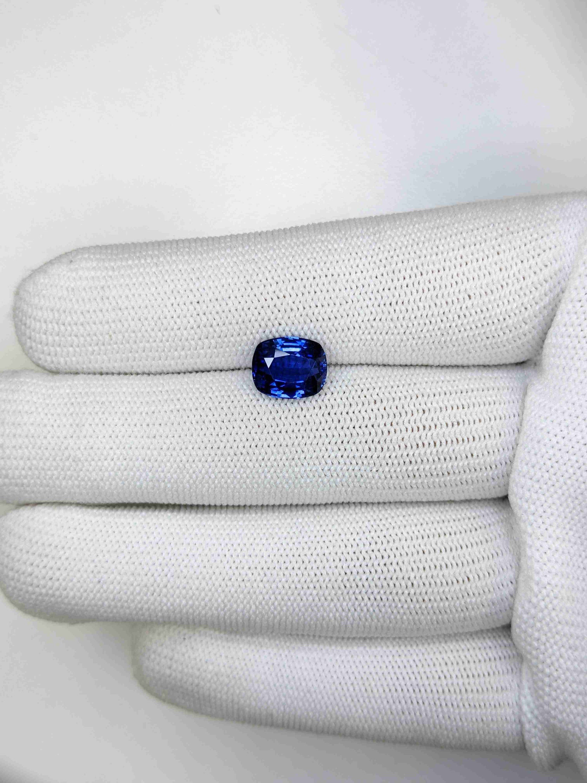 3.10 Carat Cushion Cut Heat Blue Sapphire Loose Gemstone on hand