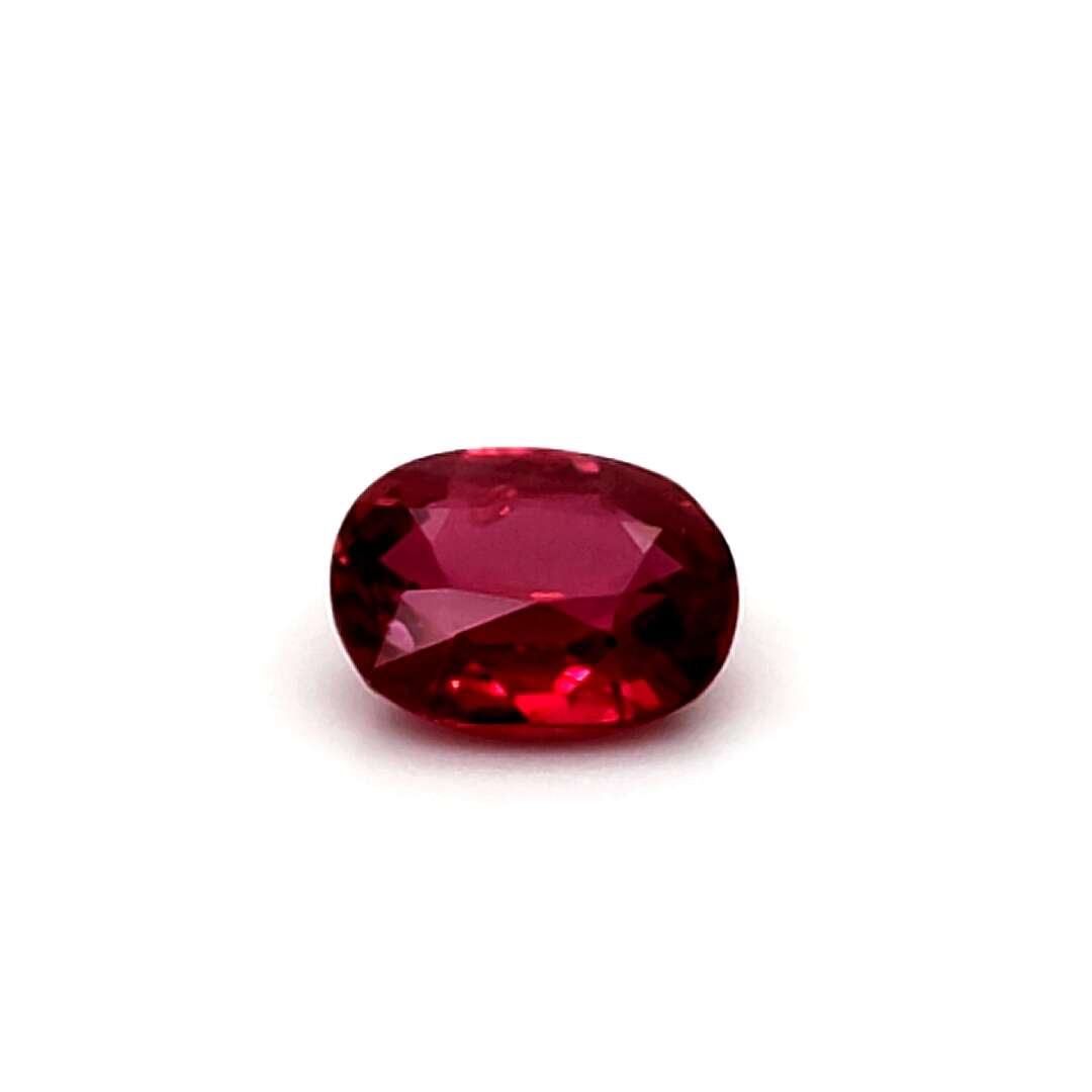 Red ruby gemstone on a white background