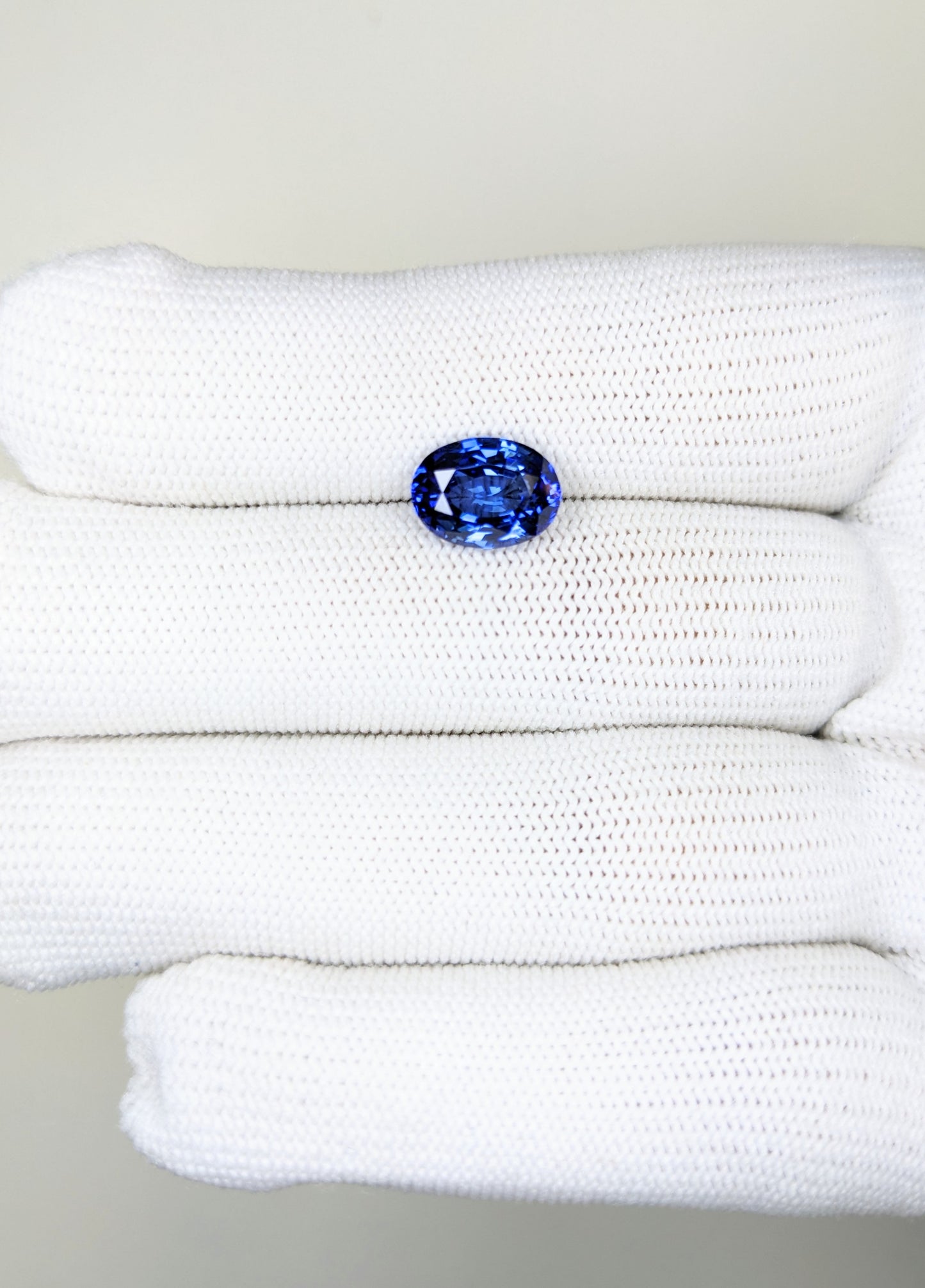 3.27 Carat Oval Cut Heat Blue Sapphire Loose Gemstone on hand