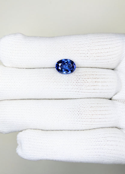 3.27 Carat Oval Cut Heat Blue Sapphire Loose Gemstone on hand