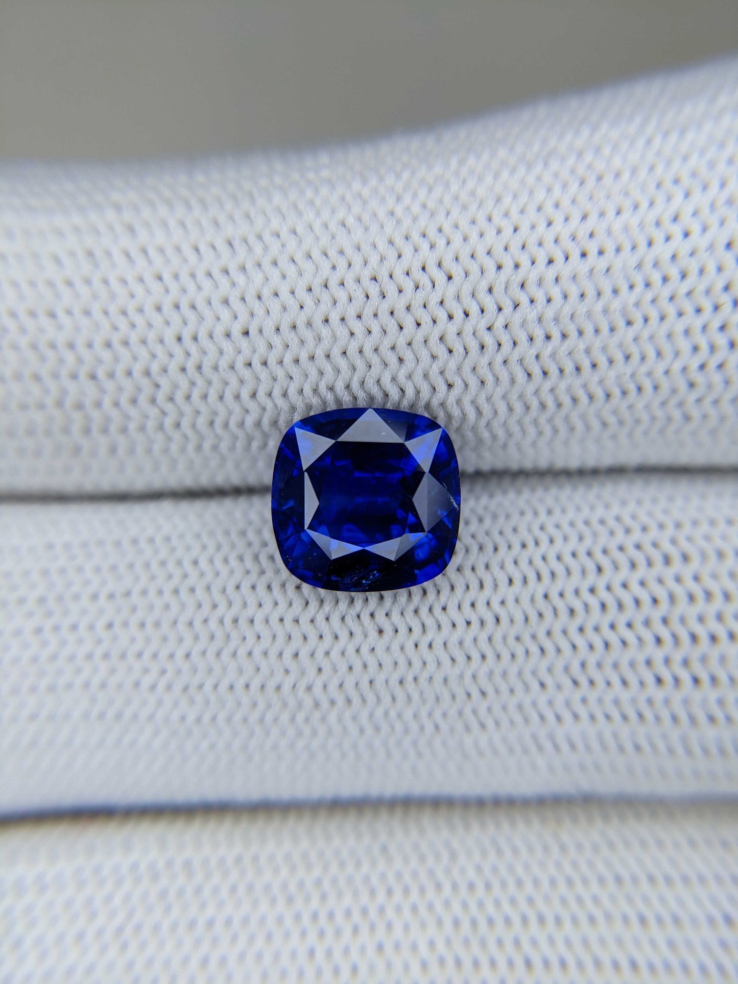 3.77 Carat Cushion Cut Heat Blue Sapphire Loose Gemstone on hand