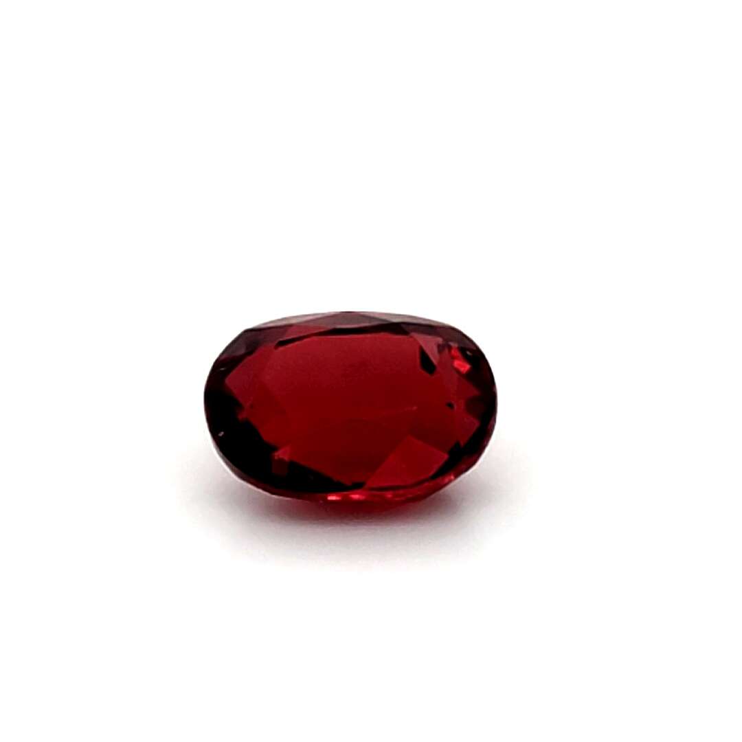 Red ruby gemstone on a white background