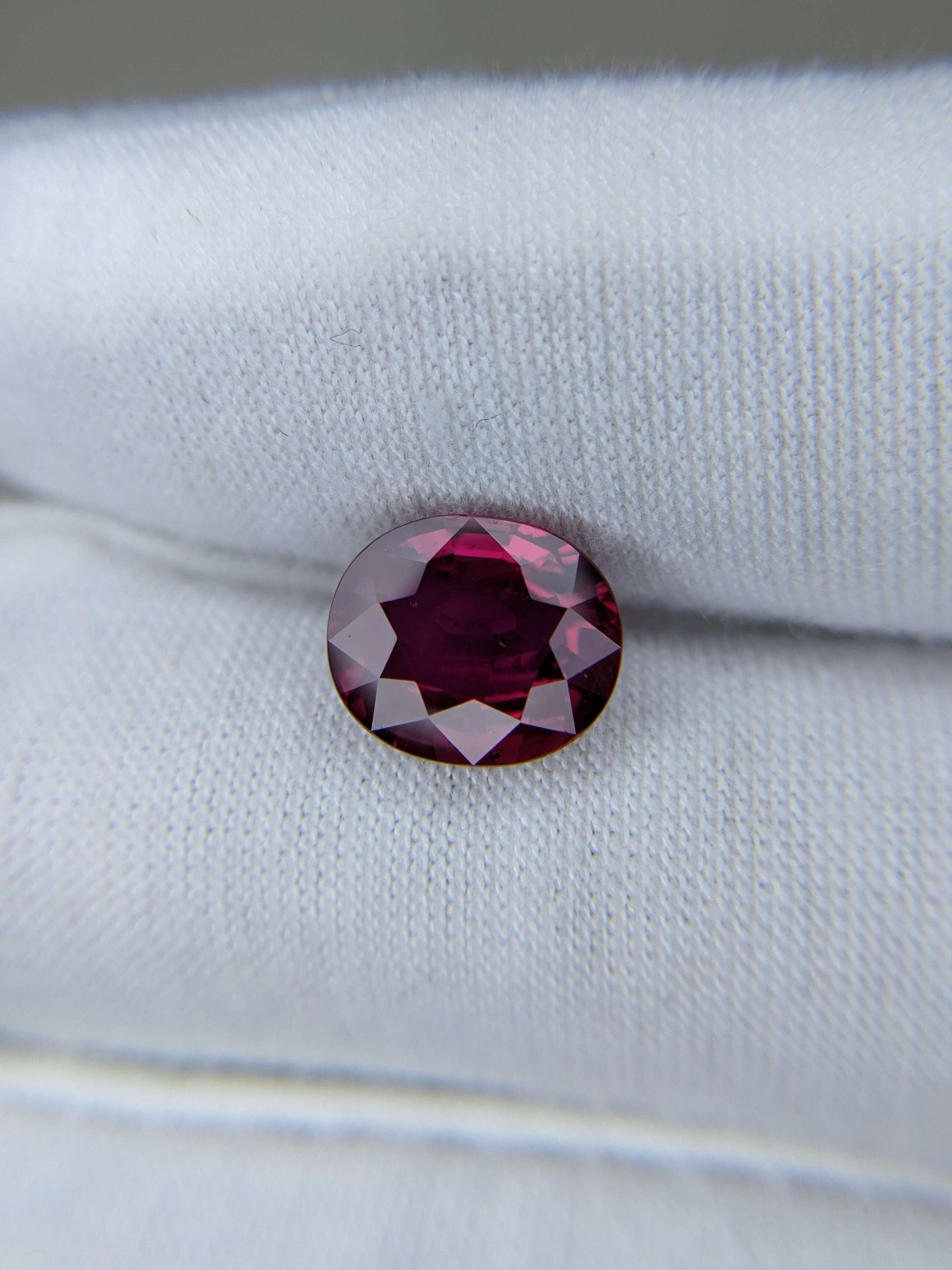Red Ruby no heat gemstone on a white background