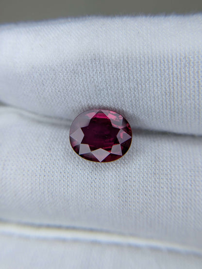 Red Ruby no heat gemstone on a white background