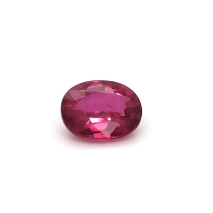 Red Ruby no heat gemstone on a white background