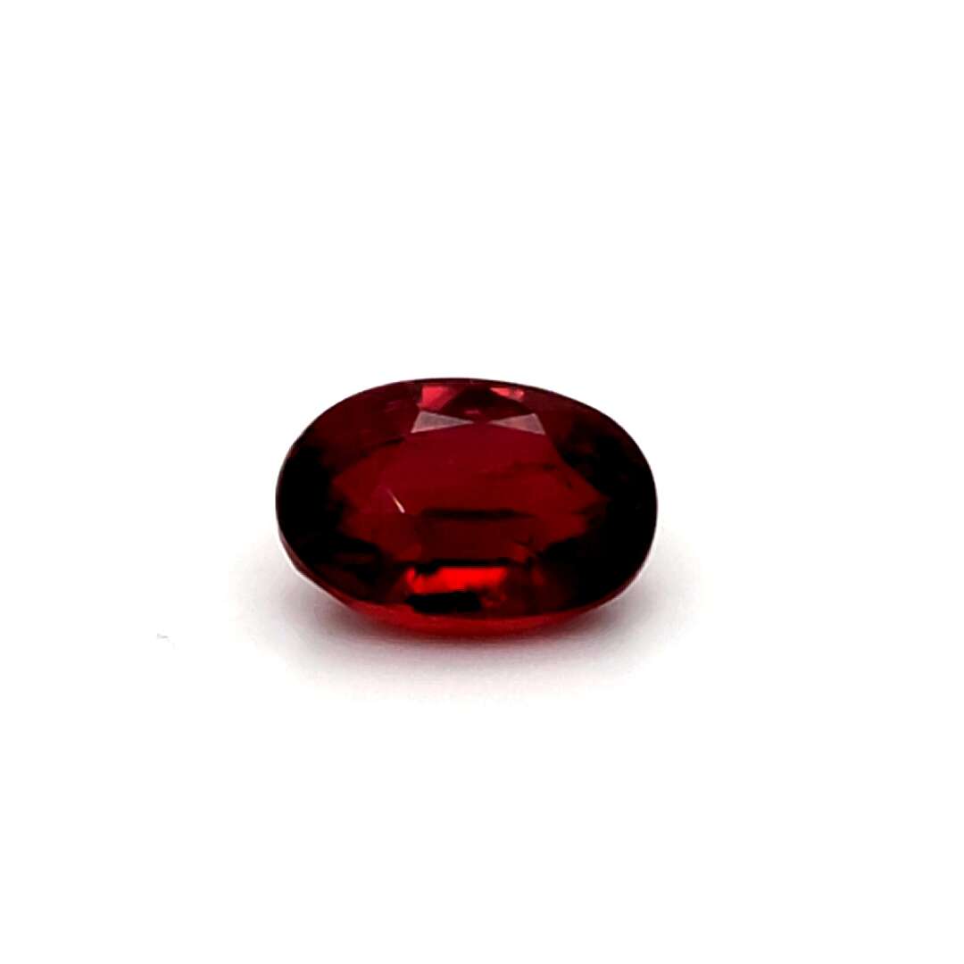 Red Ruby gemstone on a white background