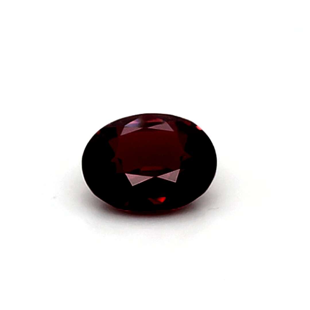 Red ruby gemstone on a white background