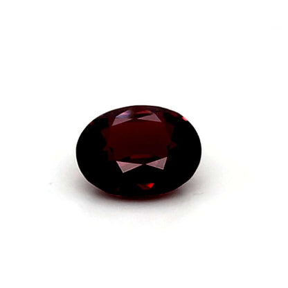Red ruby gemstone on a white background