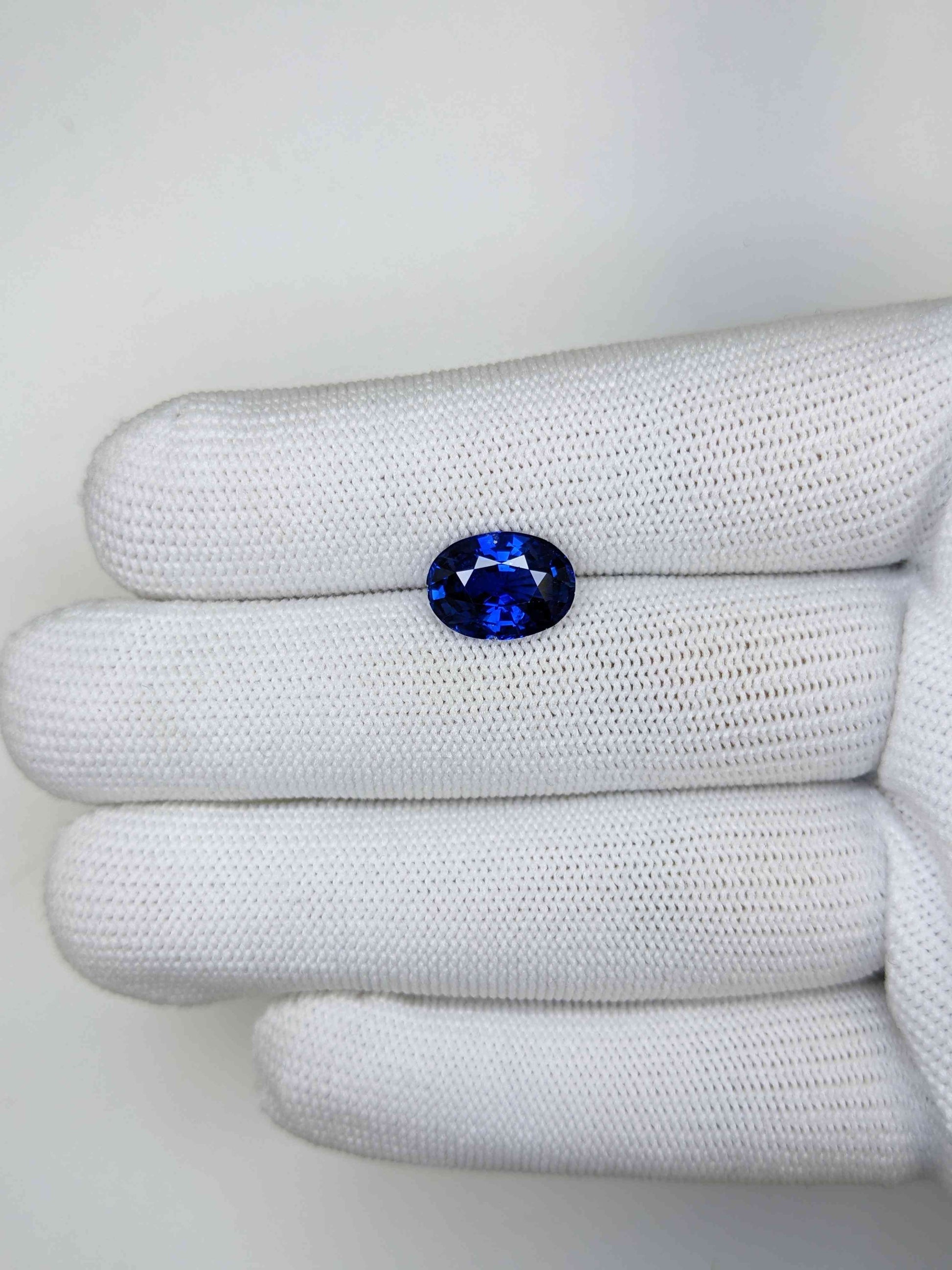4.03 Carat Oval Cut Heat Blue Sapphire Loose Gemstone On Hand