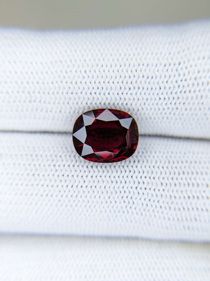 Red ruby gemstone on a white background