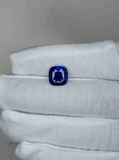 4.04 Carat Cushion Cut Heat Blue Sapphire Loose Gemstone on hand
