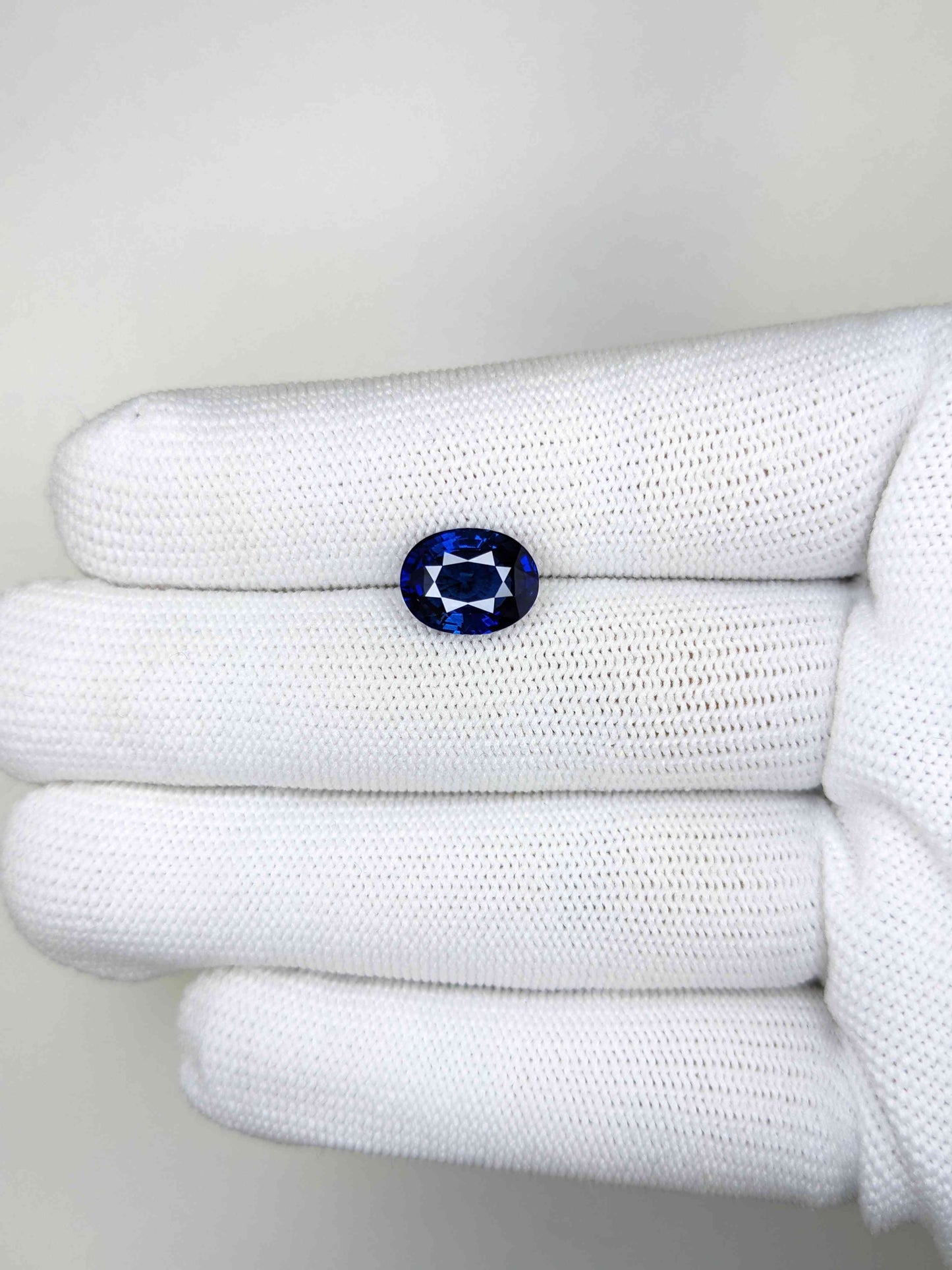4.04 Carat Oval Cut Heat Blue Sapphire Loose Gemstone On Hand