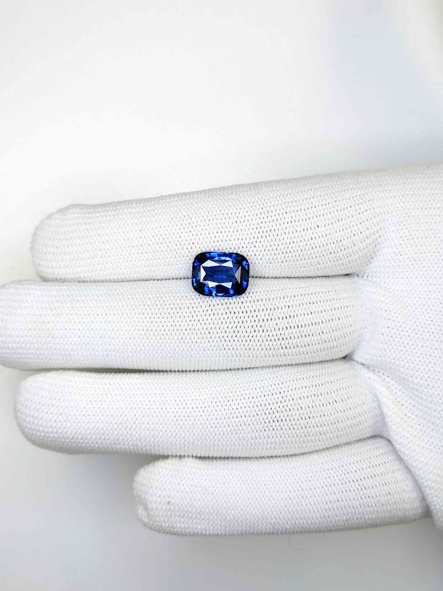 4.05 Carat Cushion Cut Heat Blue Sapphire Loose Gemstone On Hand