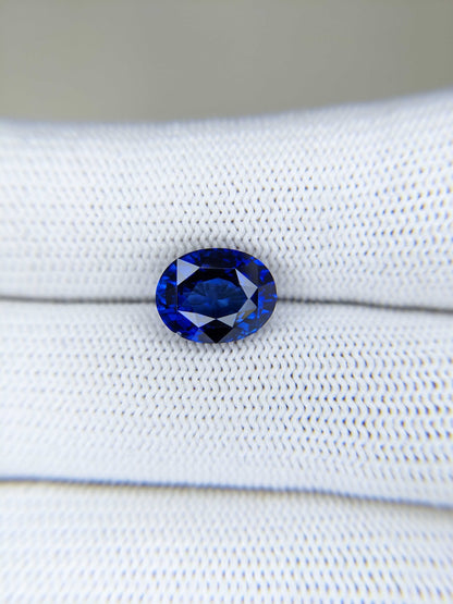 4.06 Carat Oval Cut Heat Blue Sapphire Loose Gemstone On Hand