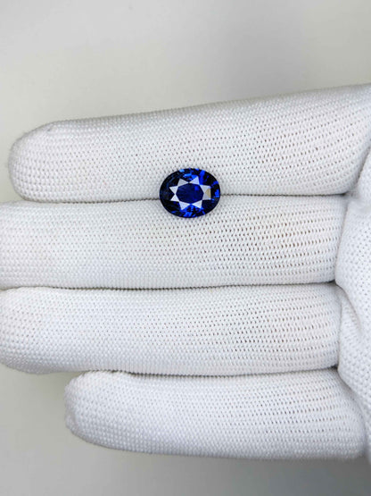 4.13 Carat Oval Cut Heat Blue Sapphire Loose Gemstone On Hand