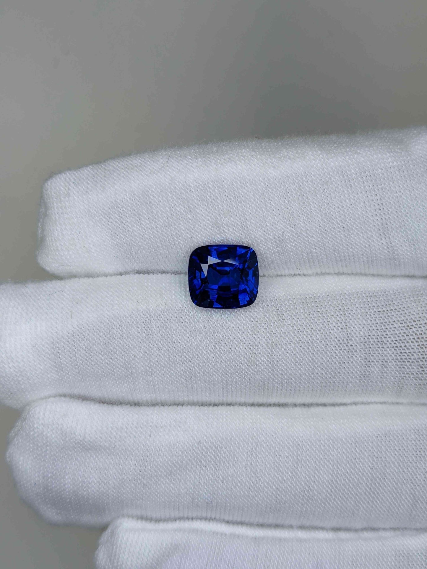 4.24 Carat Cushion Cut Heat Blue Sapphire Loose Gemstone On Hand