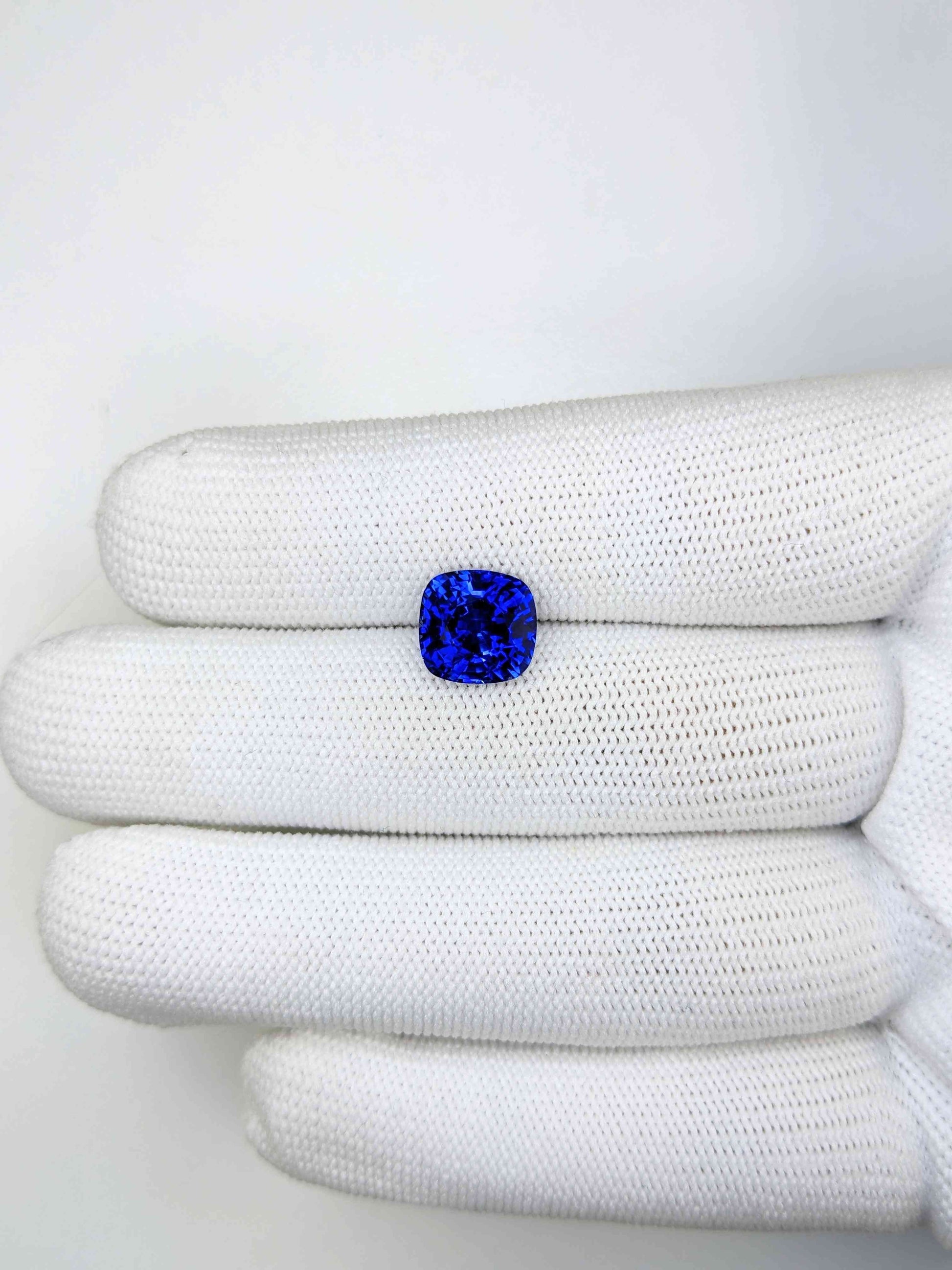 4.51 Carat Cushion Cut Heat Blue Sapphire Loose Gemstone On Hand