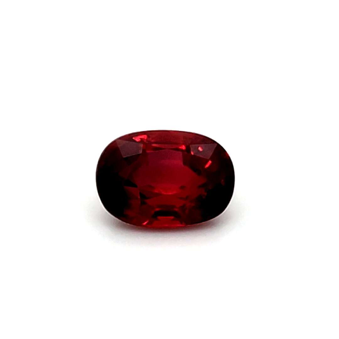 Red ruby gemstone on a white background