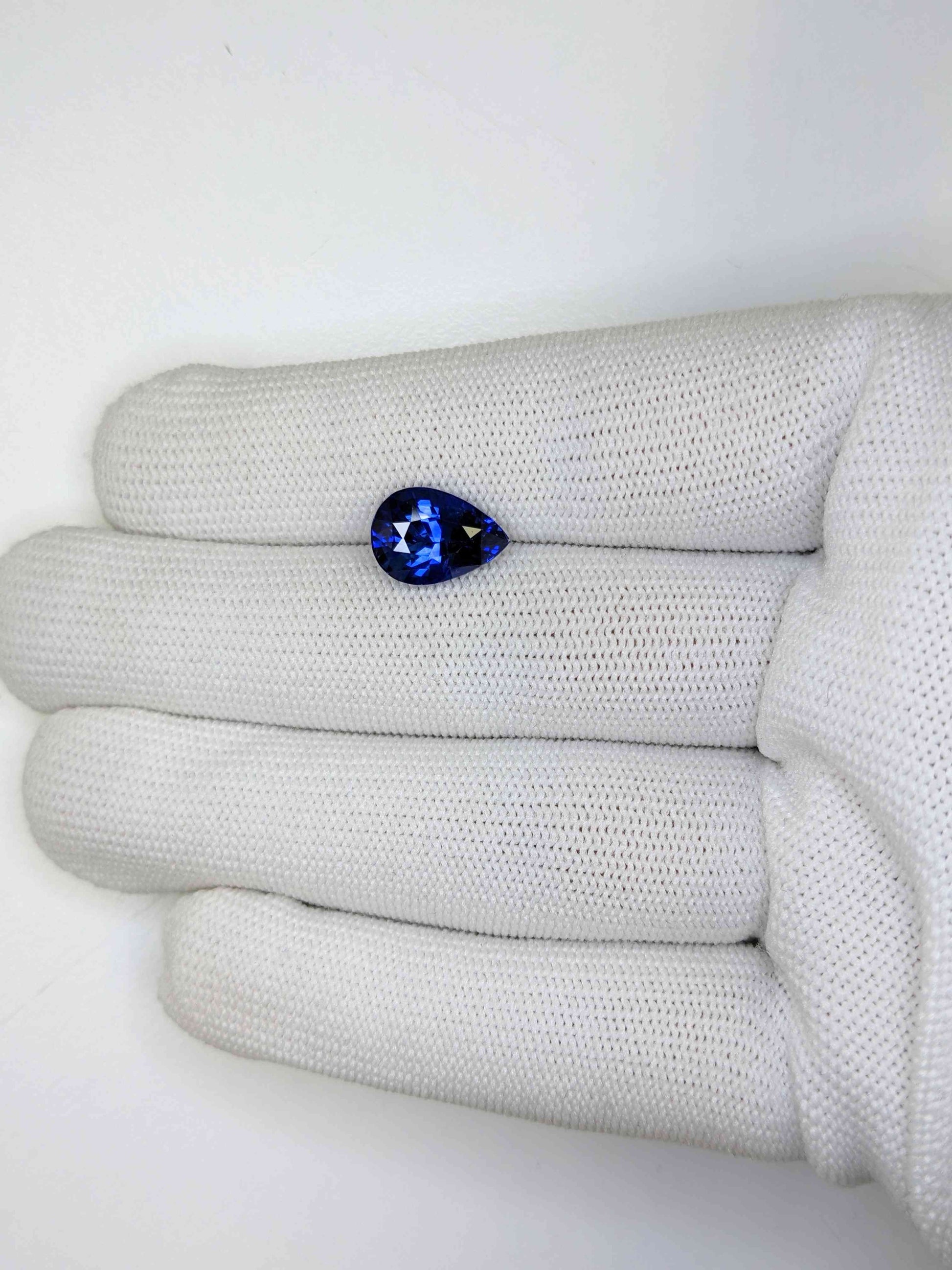 4.61 Carat Pear Cut Heat Blue Sapphire Loose Gemstone On Hand